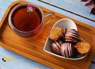 طرز تهیه توپک لوتوس؛ شیرینی بیسکویتی ساده و خوش طعم طرز تهیه توپک لوتوس؛ شیرینی بیسکویتی ساده و خوش طعم